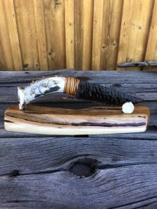 Obsidian knife with scrimshaw deer antler handle