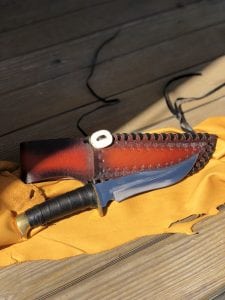 Handmade knife and sheath Made from circular saw blade and has leather wrapped handle By Ojibway Native American Mookooman Inini 11 1/2